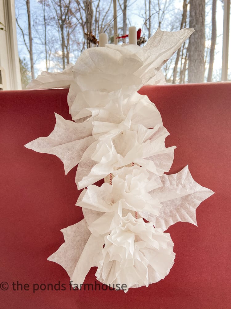 Garland with flowers made from DIY Coffee Filters perfect for Christmas table garland.