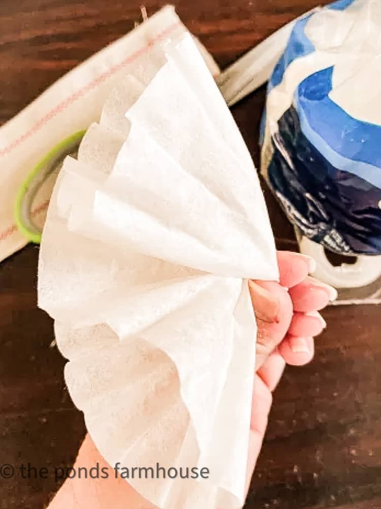 shape coffee filters to look like flowers for garland.