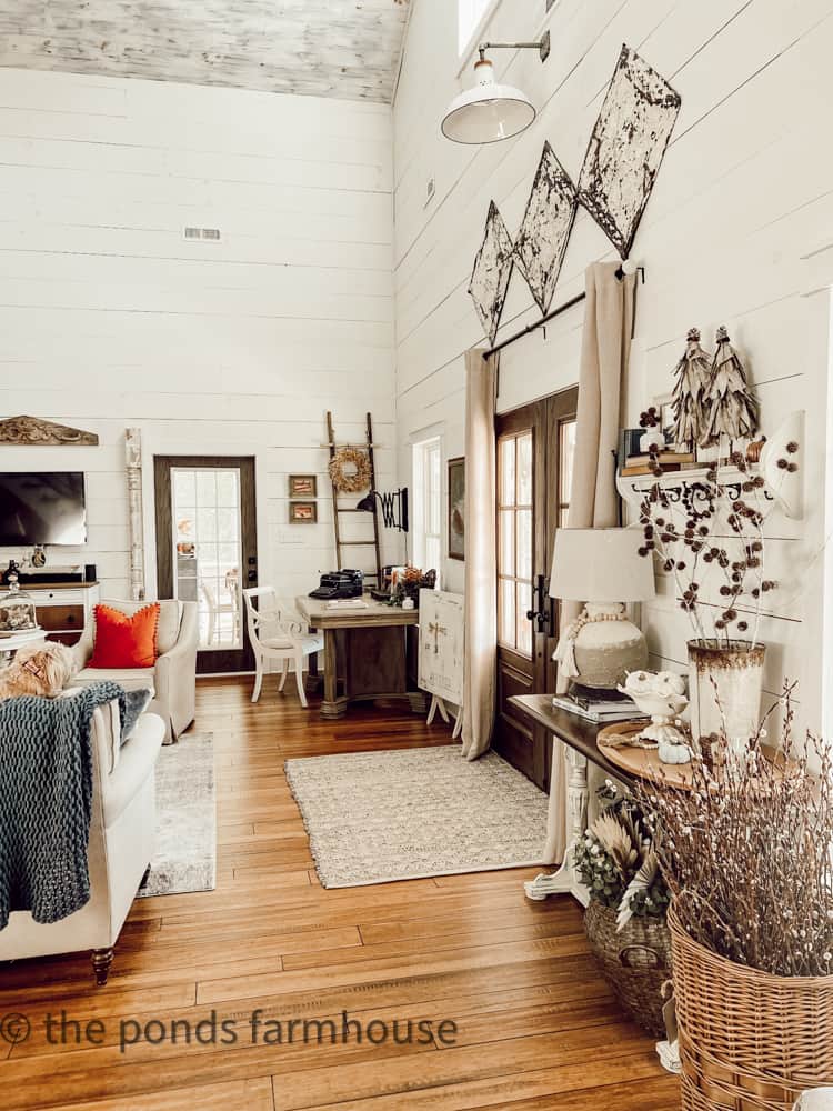 Shiplap wall and vintage old porch post in modern farmhouse.  