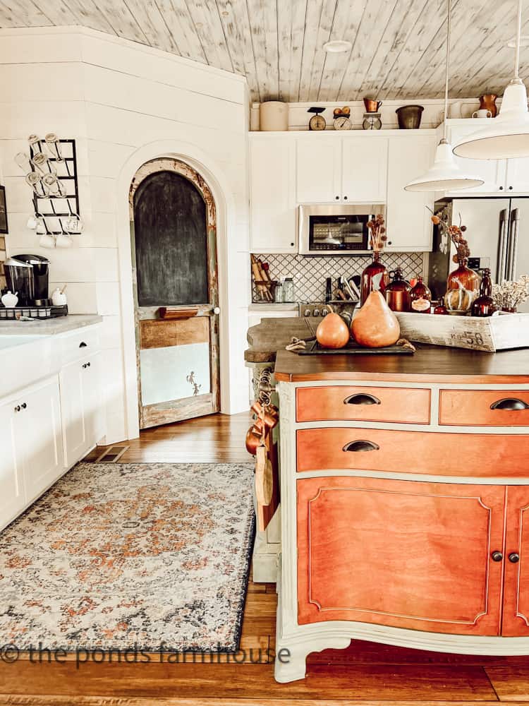 Repurposed Screened Door is now a Pantry Door with Chalkboard and magnetic board in farmhouse kitchen.