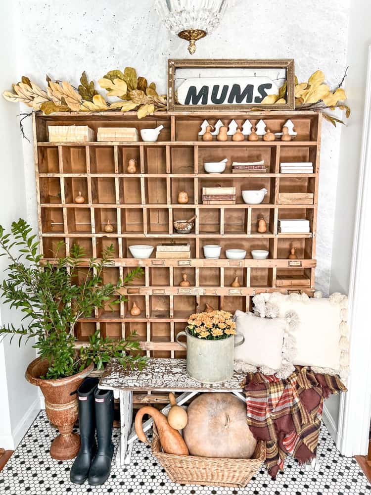 Fall Entryway decor ideas with gourds and antique thrifted decor.