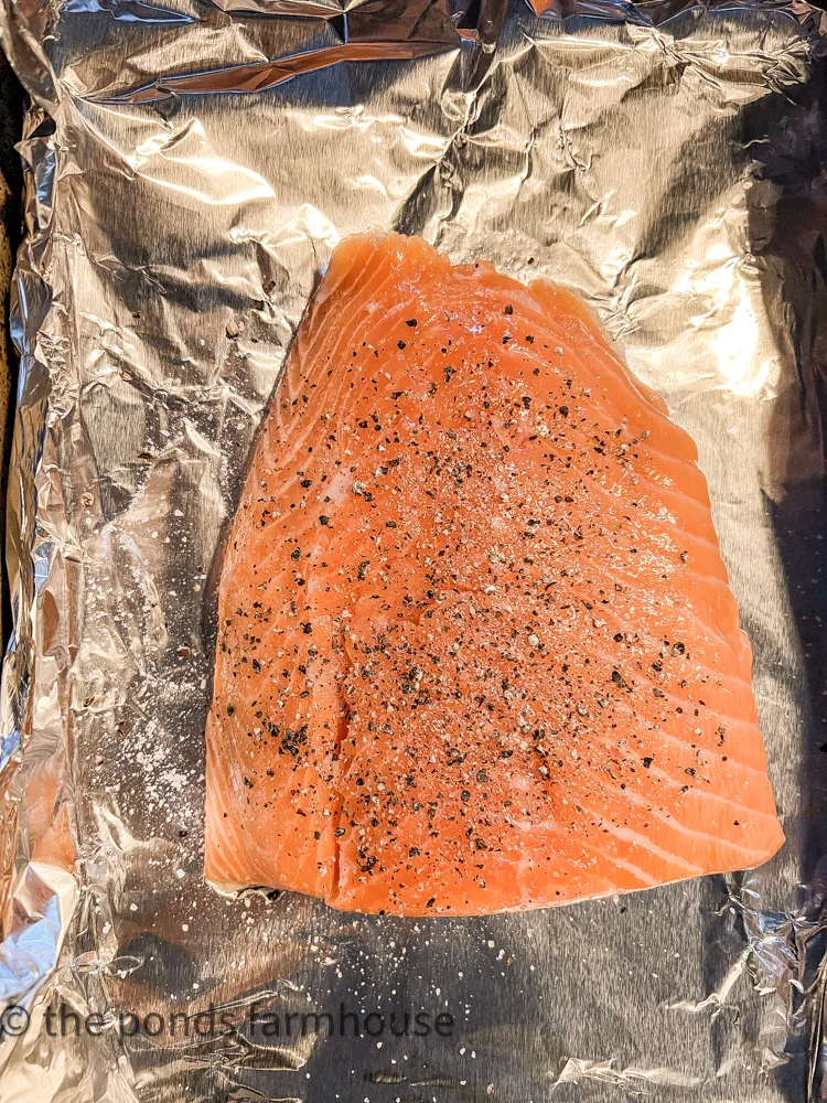 Season Salmon prior to adding to smoker for Chowder Recipe