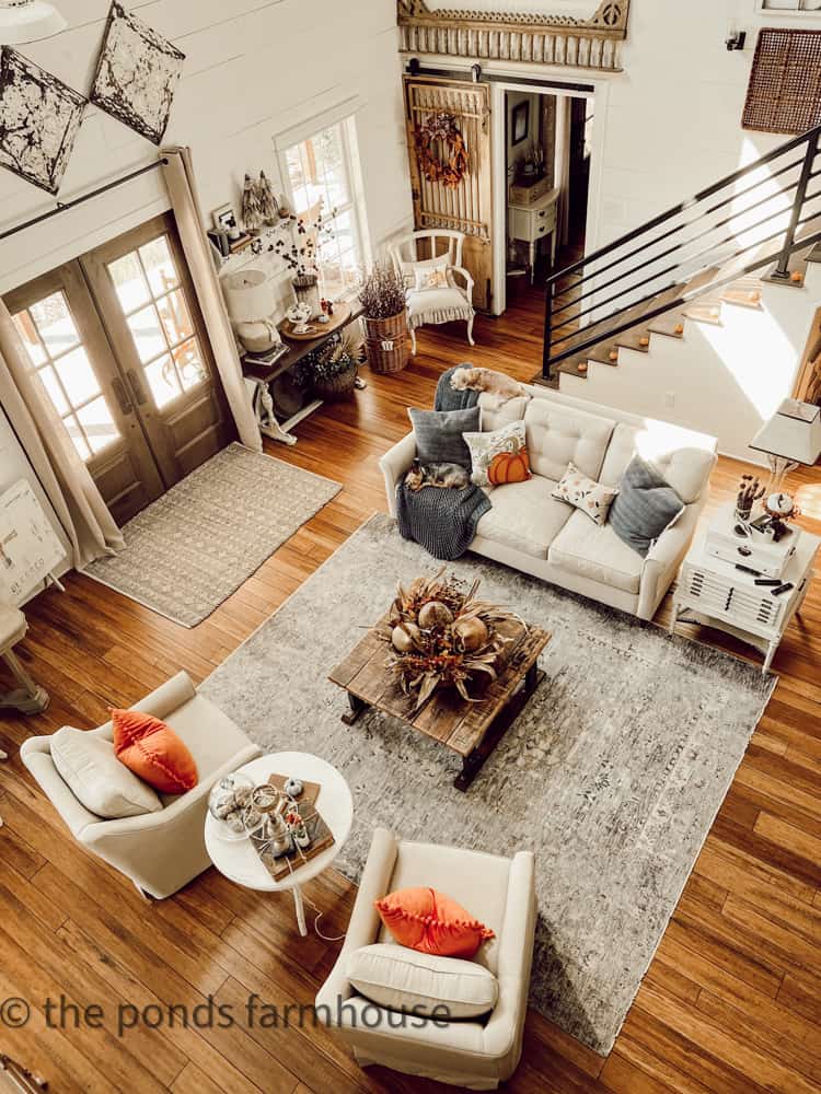 Industrial Farmhouse Fall Home Tour overhead view from the loft.  Pops of burnt orange and blues for Autumn Decorating.