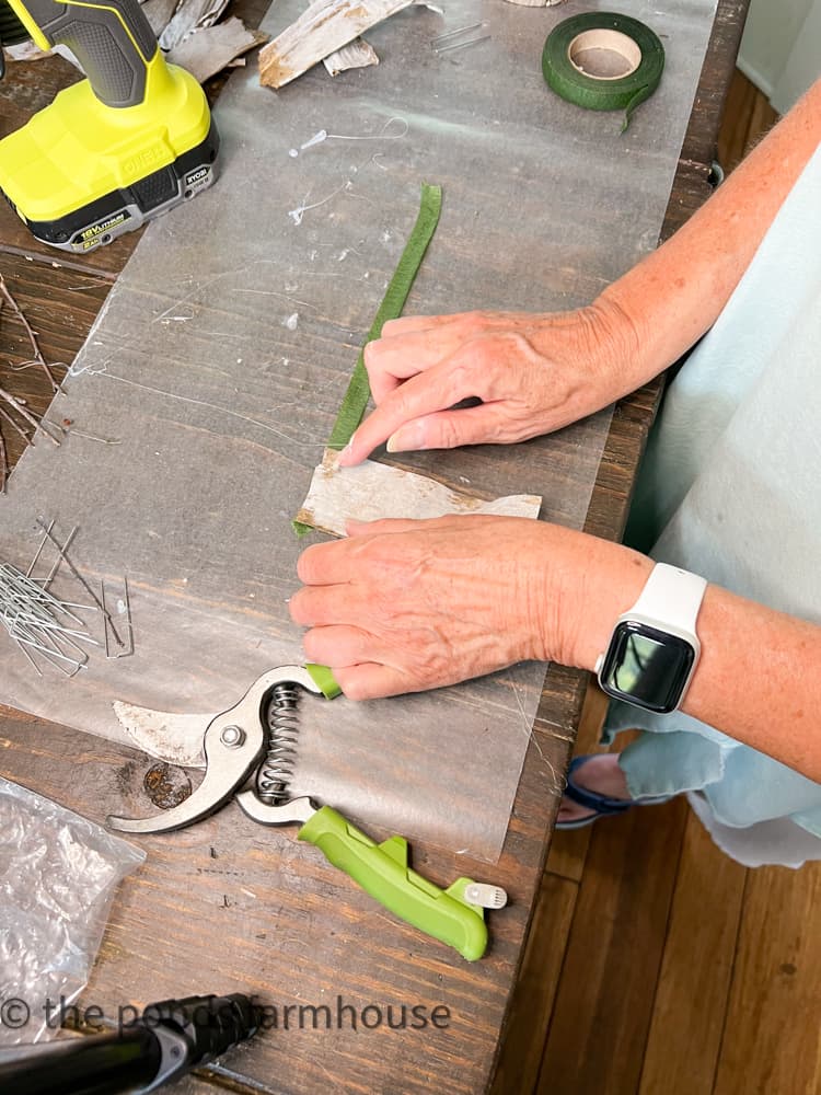 Attach corn husks to floral tape with hot glue. 