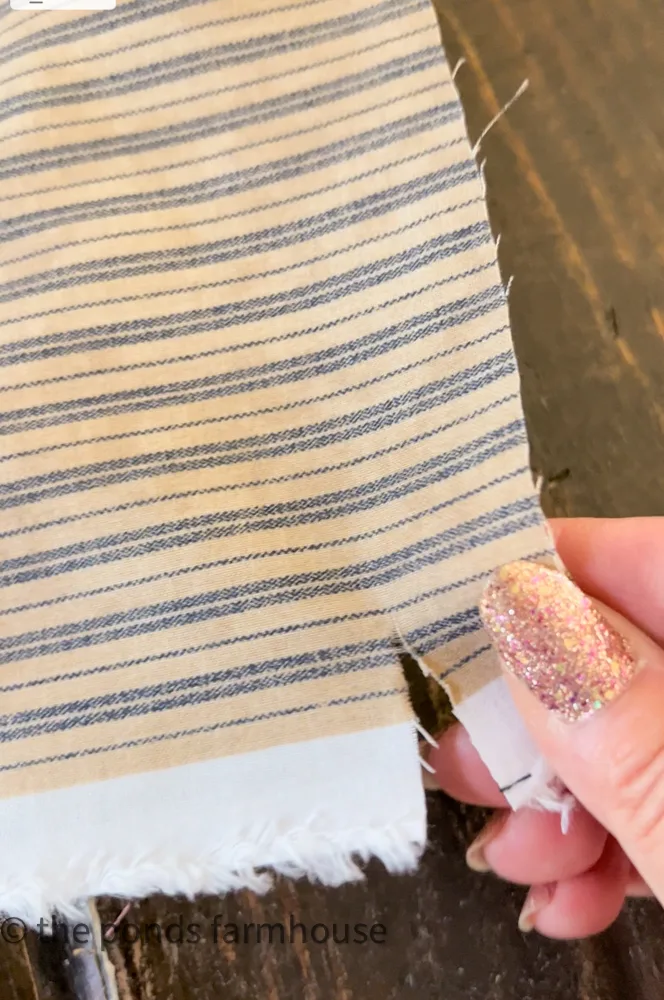 Cut a small amount to allow for the fabric to be ripped for scrap fabric project.