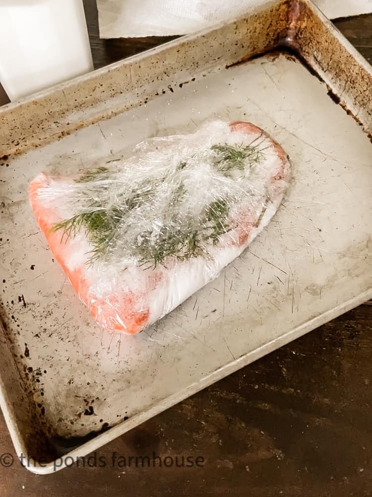 wrap salmon in plastic for making cured smoked salmon.  