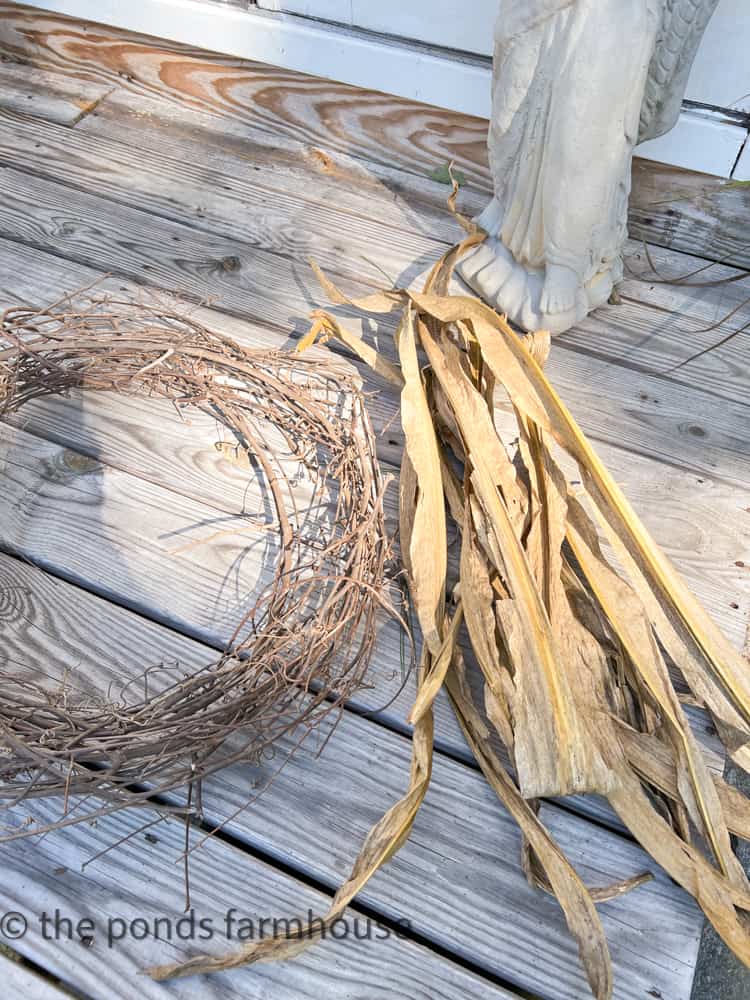 Corn husk fall craft supplies to make a cheap and easy fall decoration - Fall Corn Stalk Wreath.