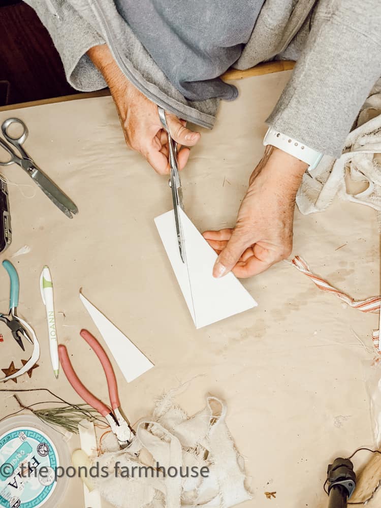 Use recycled cardboard to make DIY Christmas Tree & Scarp Fabric Package Topper for Eco-Friendly Gift Wrap Ideas.  