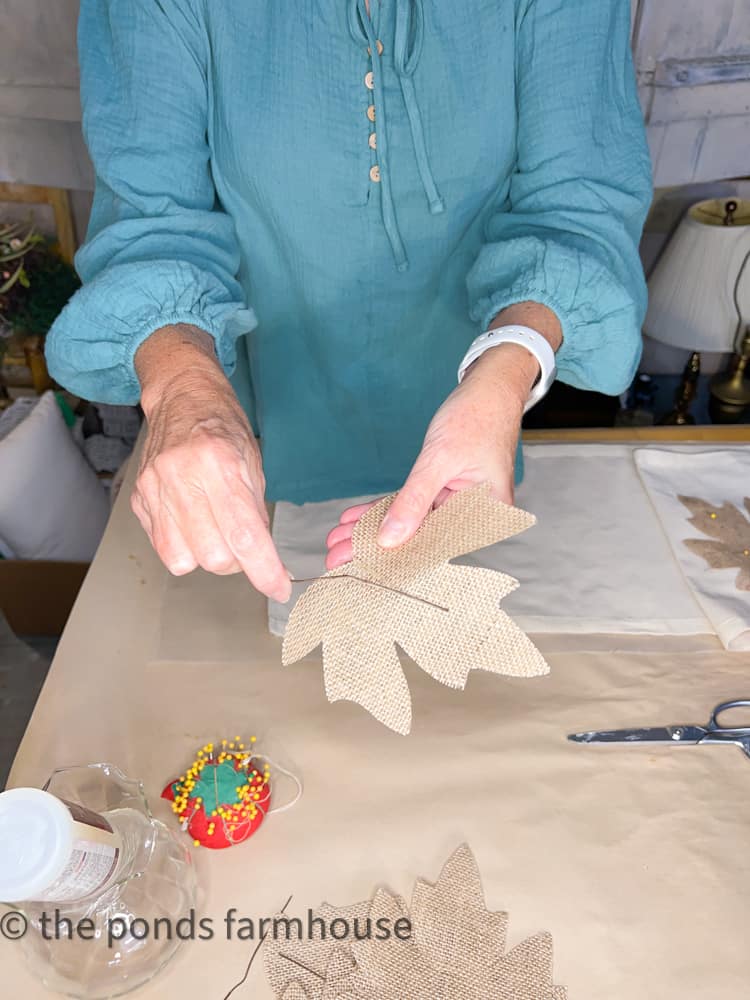 Remove stems from Dollar Tree Burlap Leaves for Farmhouse Table Runner