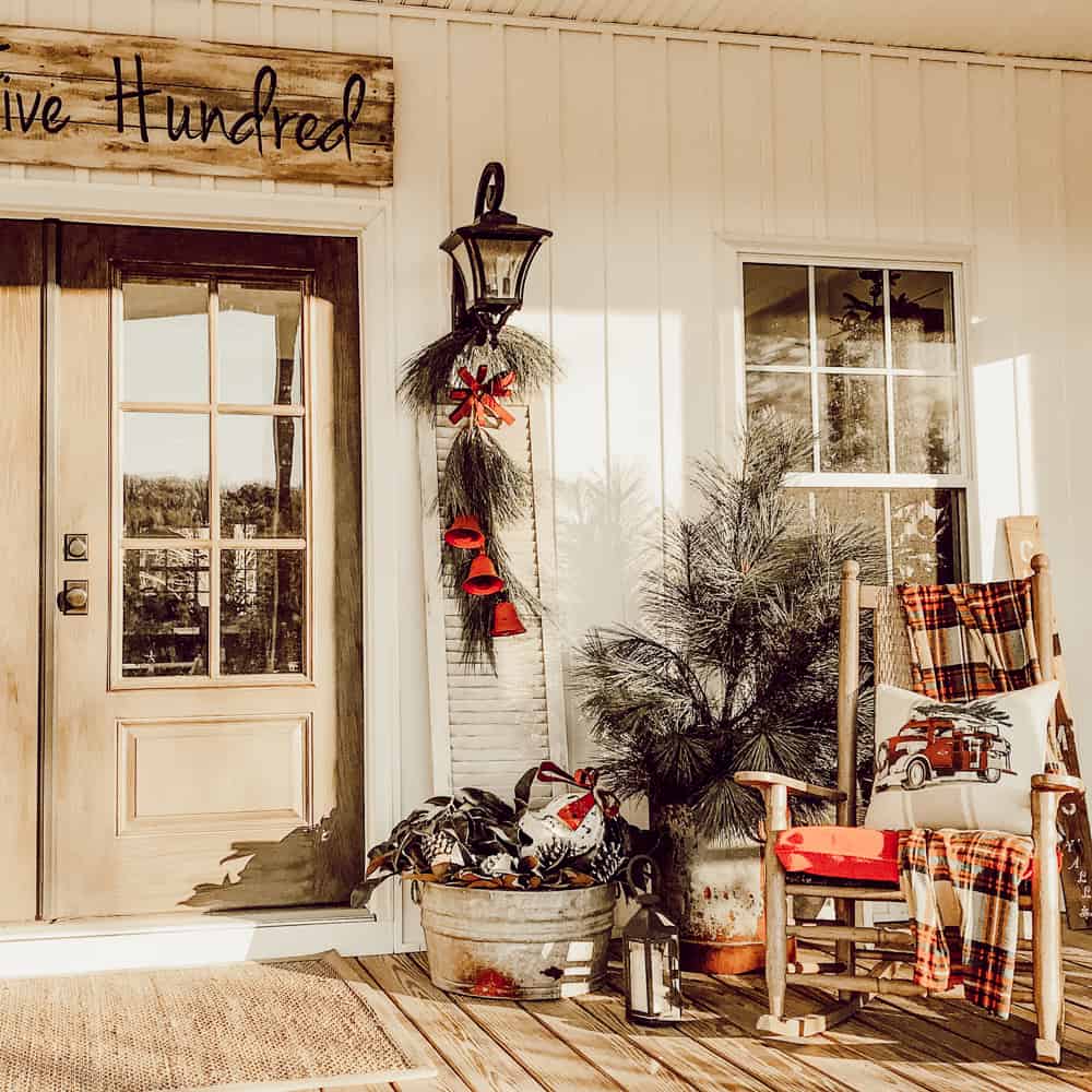 Fresh greenery of Magnolia and Pine used to decorate the front porch for Christmas