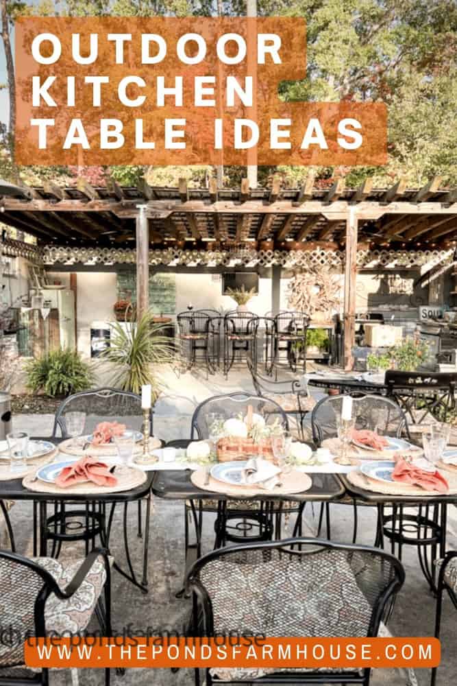 Outdoor Kitchen Decorated for Fall entertaining with tables set with orange and blue tableware.  