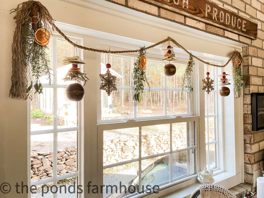 Tips to make a fresh herb and dried fruit garland for your mantel or to hang in a window.  