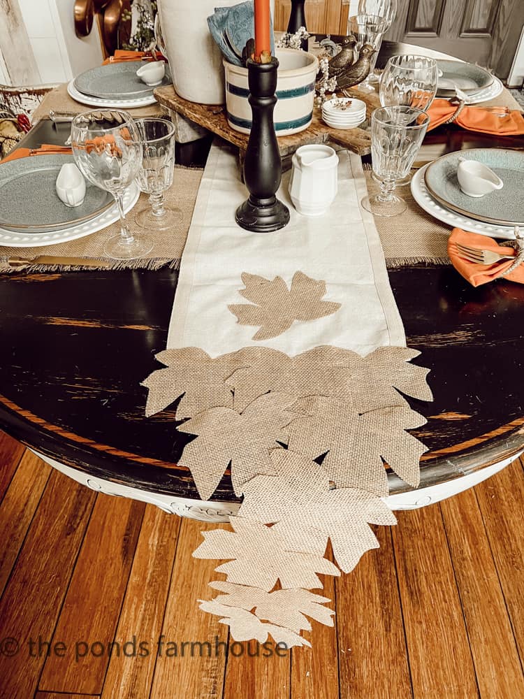 Dollar Tree Table Runner using inexpensive burlap leaves and fabric glue. Farmhouse-style.