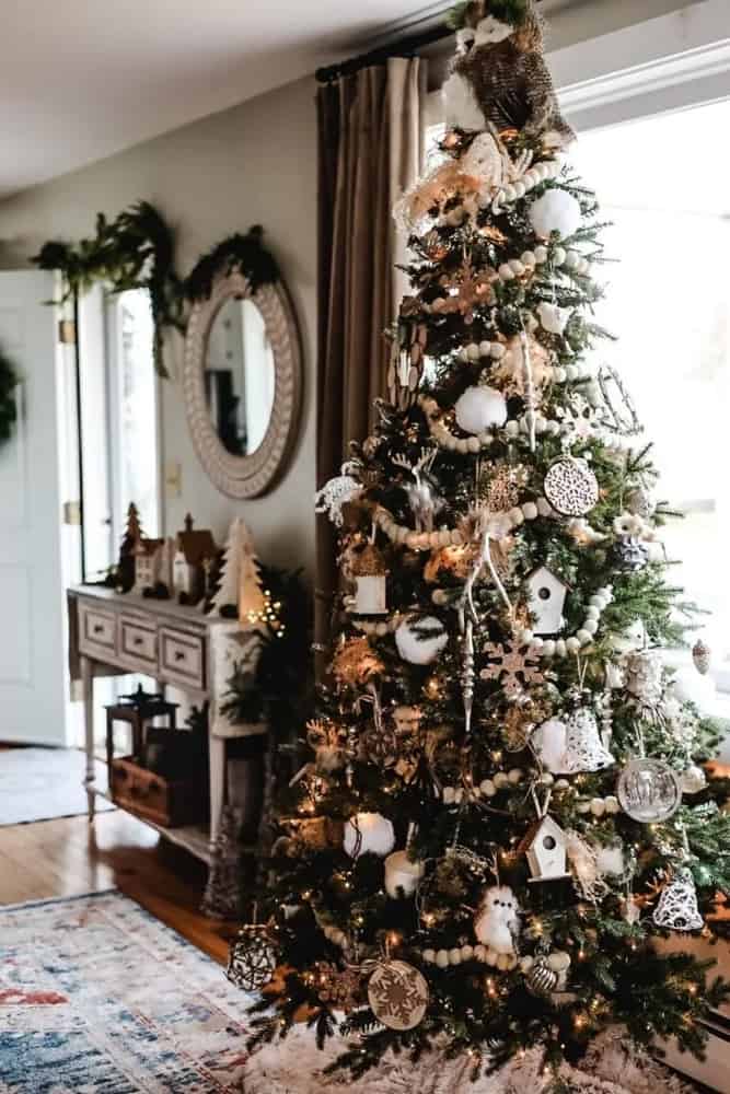 Beautiful Christmas tree with unique decorations. Farmhouse Christmas tree.