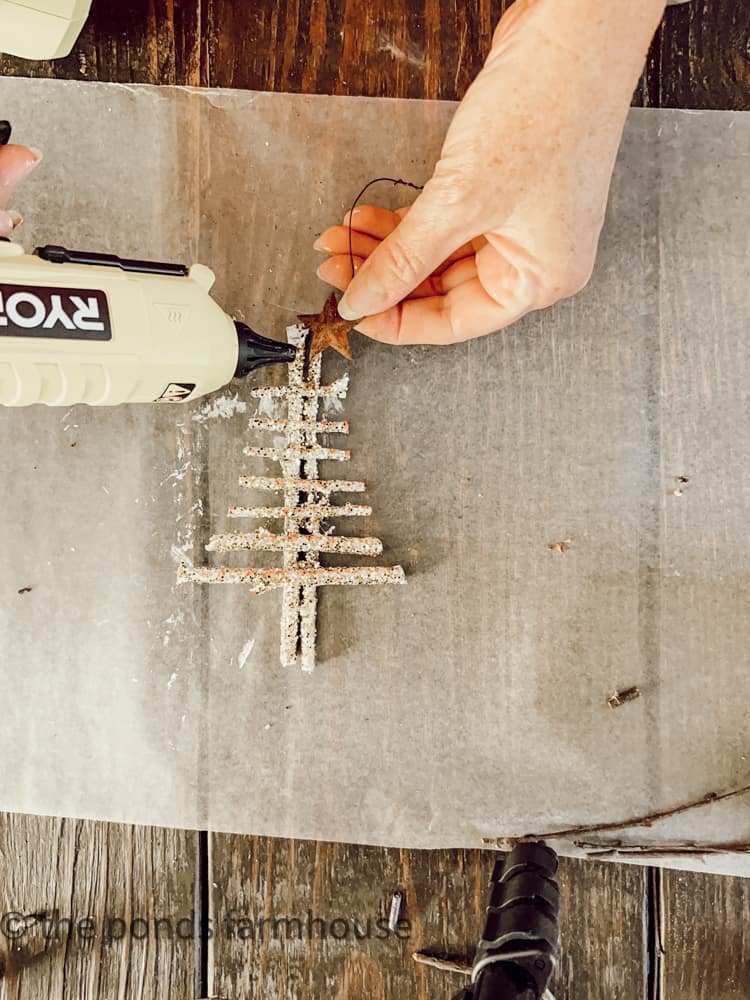 Attach rustic metal star and hanger to the top of Christmas Tree shaped eco-friendly DIY Christmas Ornaments