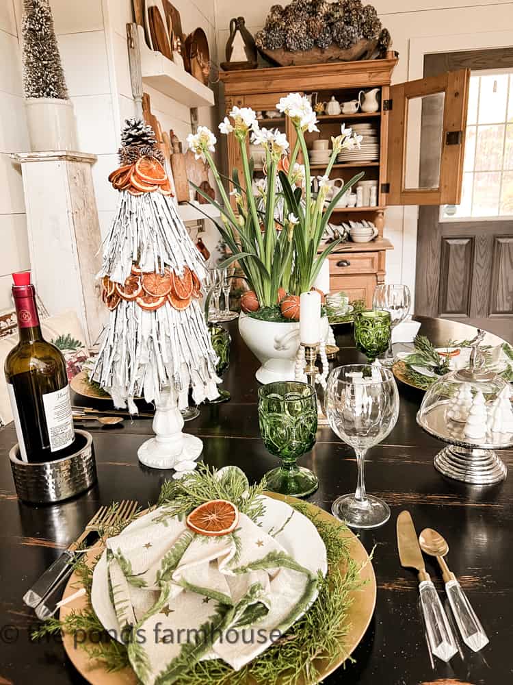 Hutch filled with ironstone at Holiday Farmhouse style tablescape.