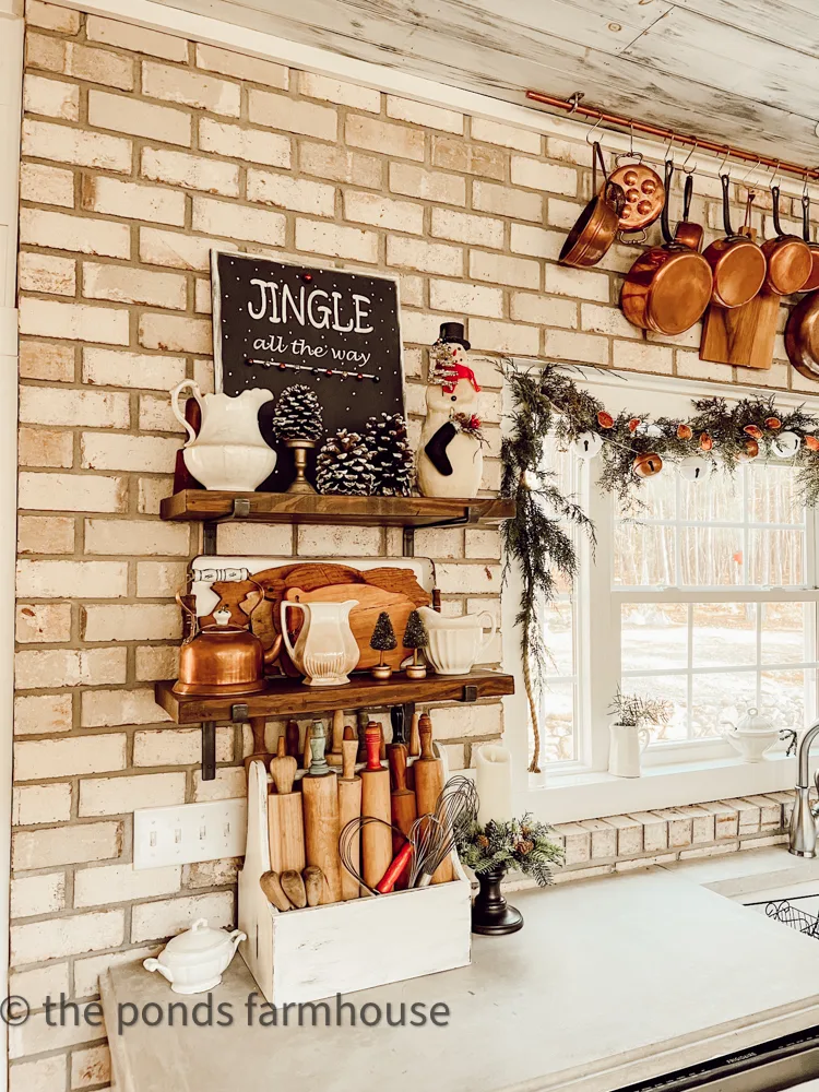 Farmhouse Kitchen Christmas Decorating for Open Shelving and Brick Wall.