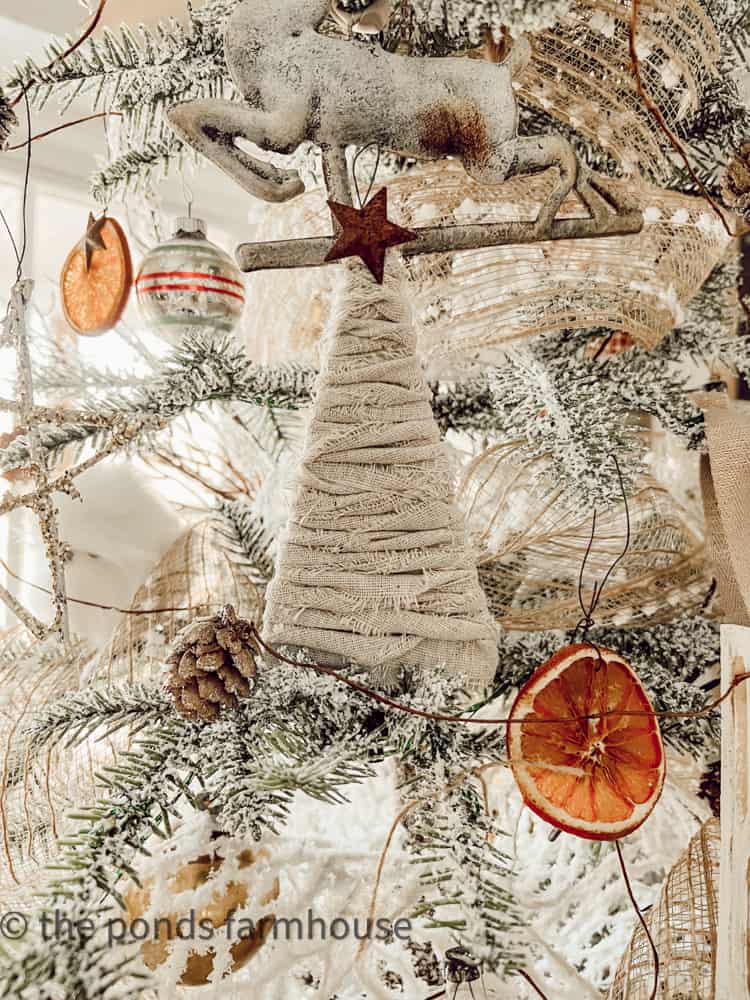 Budget Friendly Cheap Christmas Tree Decorating Ideas made from scrap fabrics and recycled cardboard.