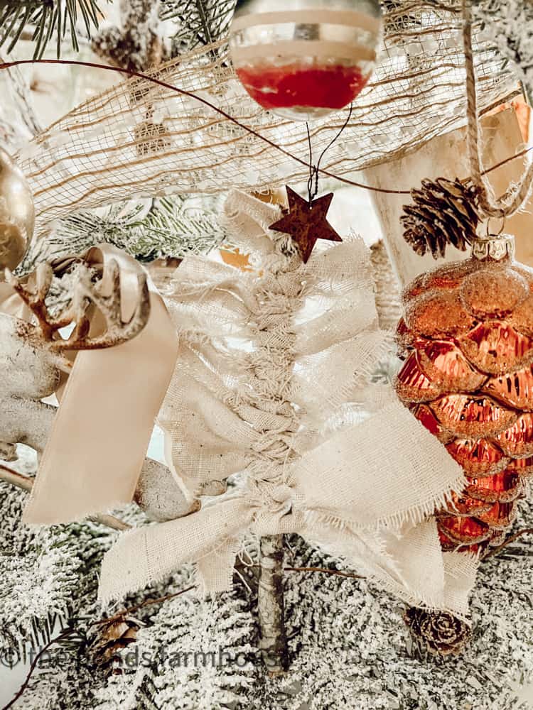 Recycled fabric and foraged twig to make a DIY Christmas Tree Ornaments for budget-friendly Christmas Decor.