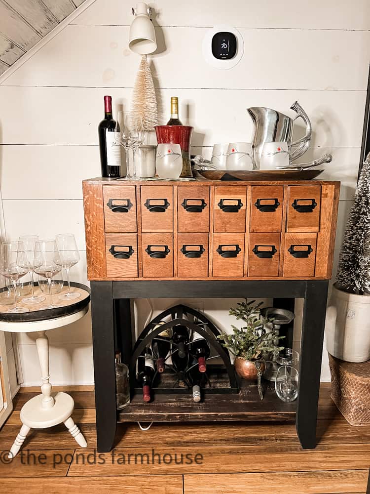 Repurposed Card Catalog is now the wine bar in the Industrial style farmhouse.