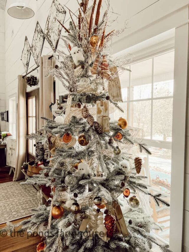 Farmhouse Christmas tree with white flocking. Country Christmas Tree.