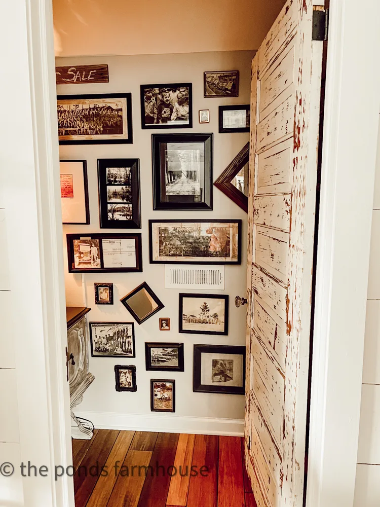 Vintage Loft Bathroom with inherited family photo gallery wall