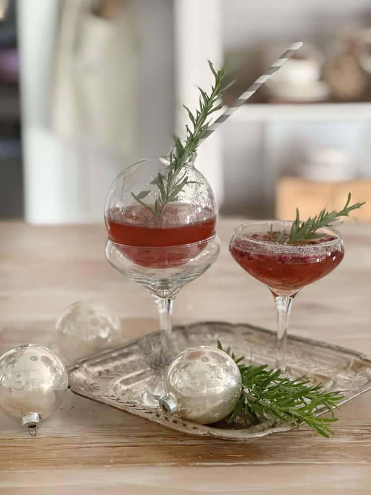 Christmas cocktail with silver tray.