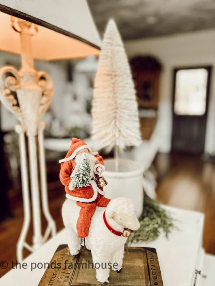 Vintage Inspired Santa riding a Sheep with bottle brush tree in old mini crock and vintage book