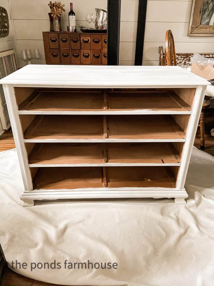 Paint outside of the cabinet with old white chalk paint.  Thrift store budget friendly furniture makeover