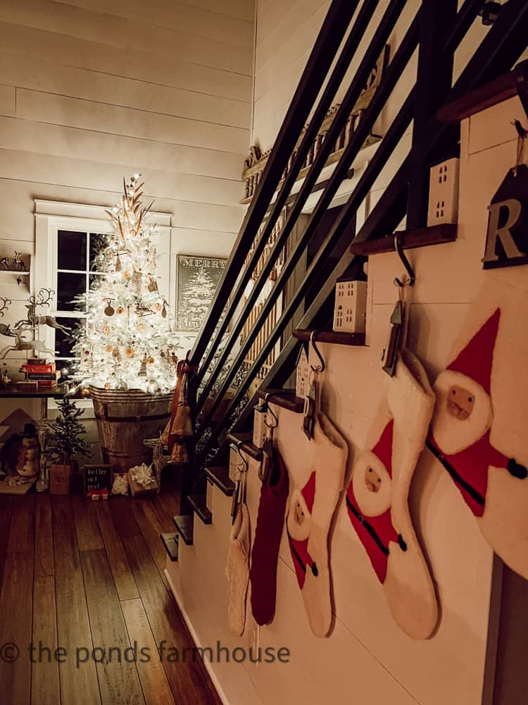 thrift store stockings and industrial staircase with woodland Christmas Tree on Candlelight Tour 