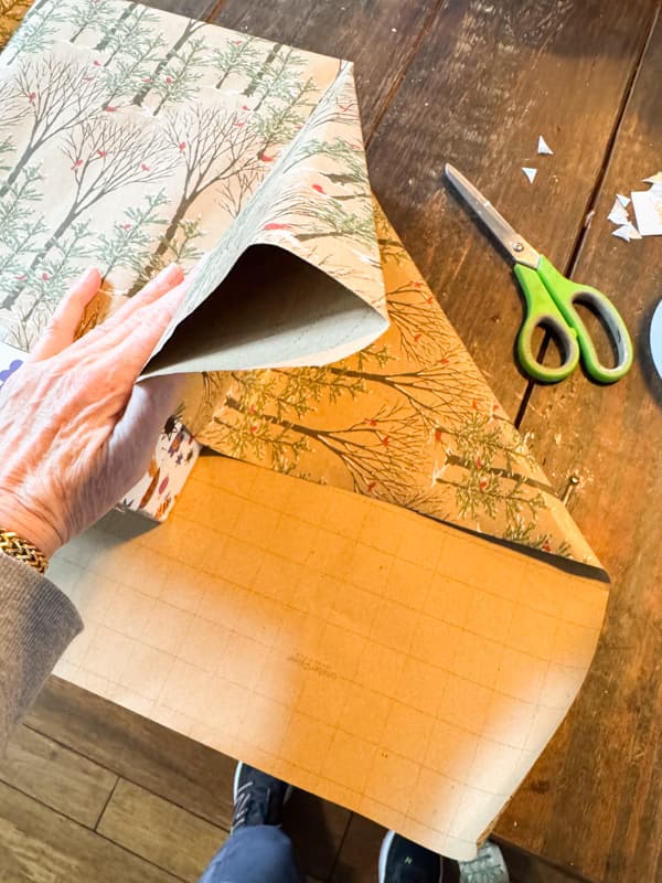 fold the side of the paper creating two triangles.  