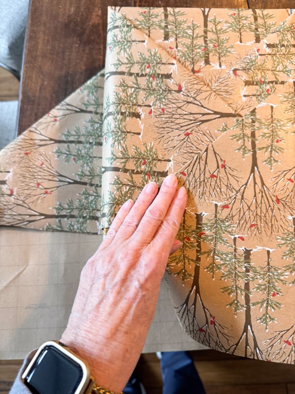 Wrap the bottom triangle of the top of the package.