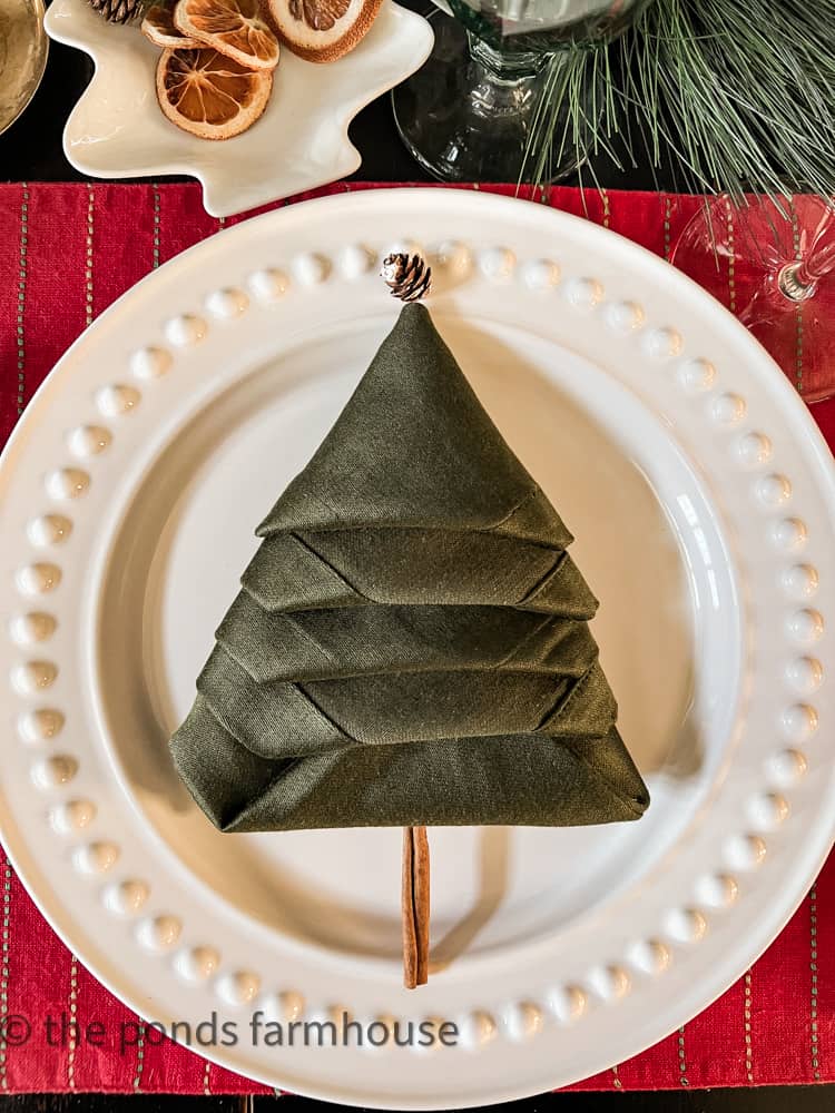 Green Napkin Christmas Tree Fold Ideas for a festive Holiday Tablescape.