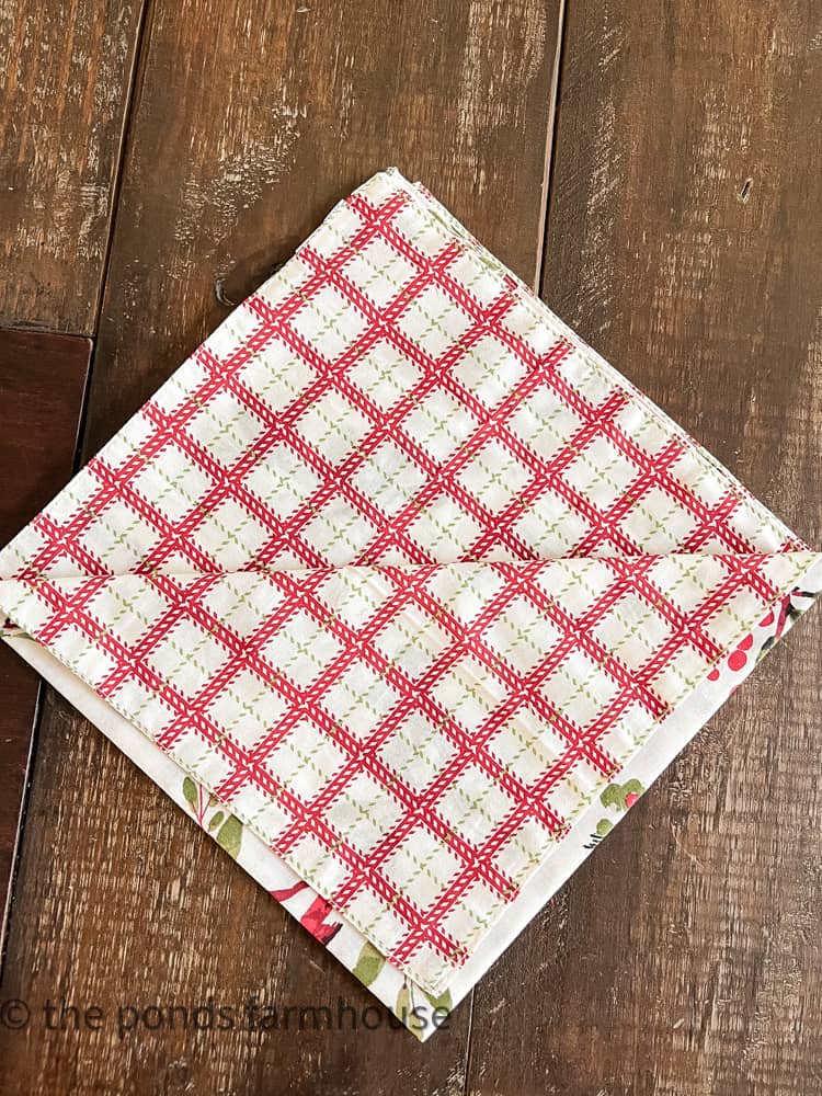 Fold napkin to make a Christmas Tree Napkin Fold