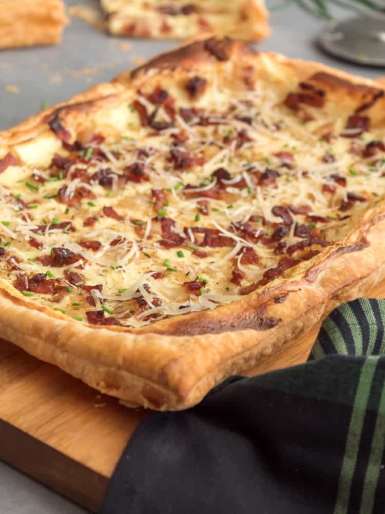 Perfect for a wine dinner party menu is a bacon cheese and onion tart recipe.