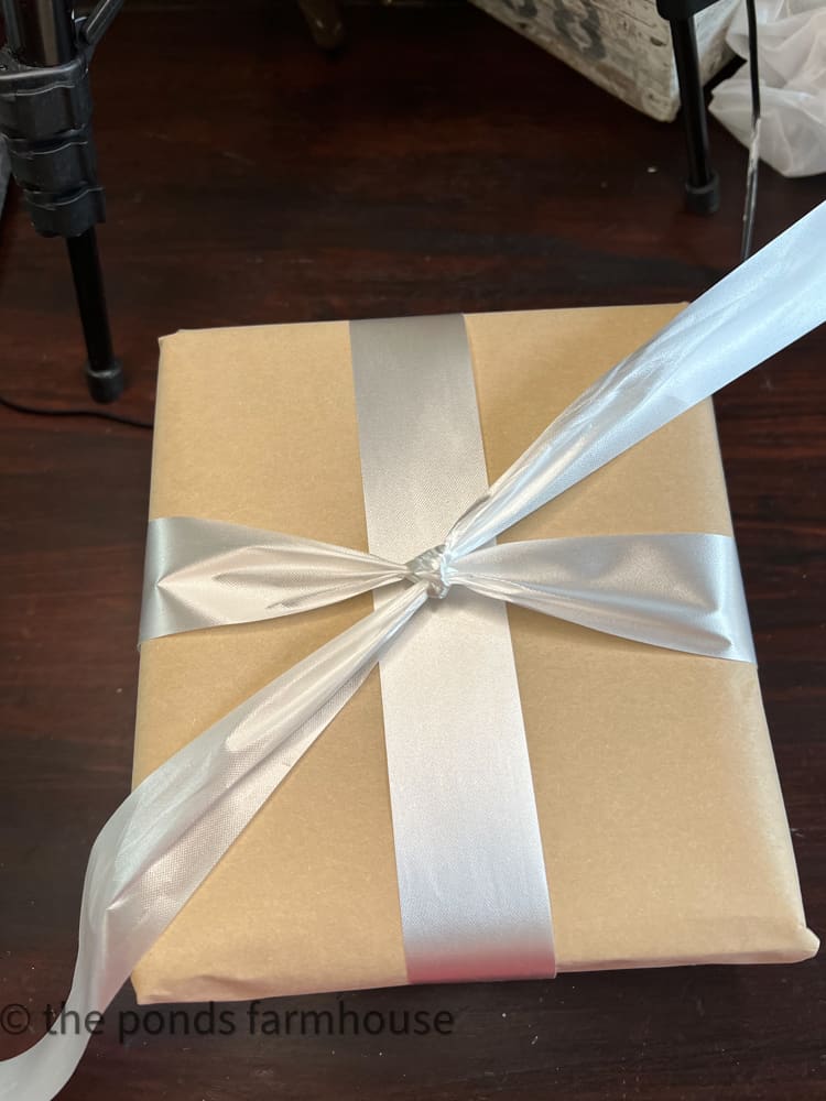 tie ribbon onto gift packages for Christmas Gift Ideas