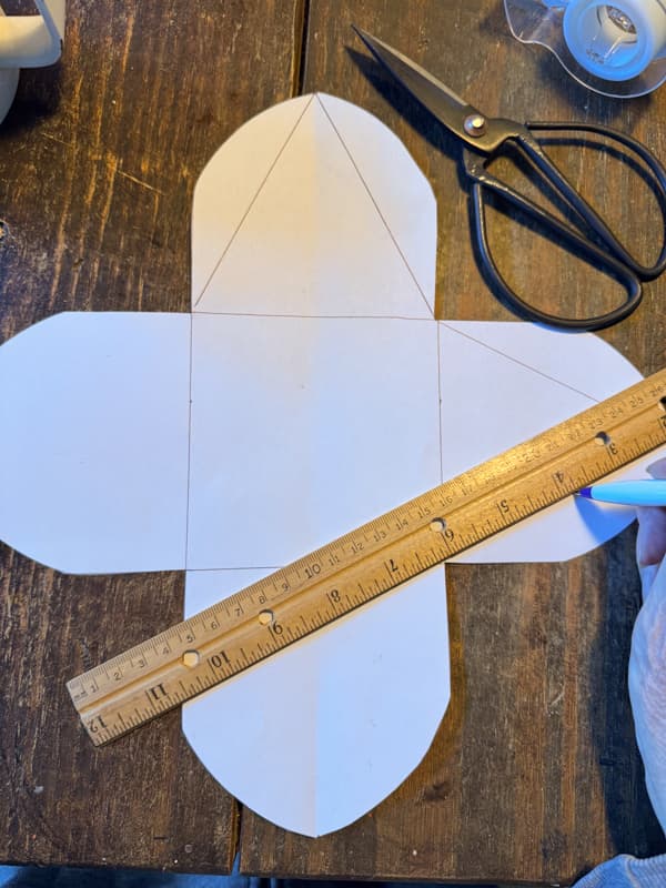 Draw fold lines on each section of paper