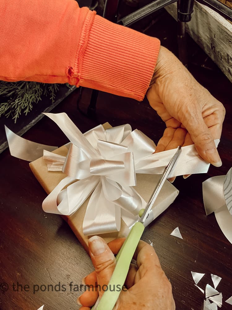 How to Tie A Perfect gift Bow for Christmas and beyond.  Bow for holiday wreaths and more.