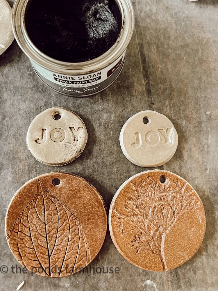 Wax on clay ornament or leave plain with gold or copper spray paint.
