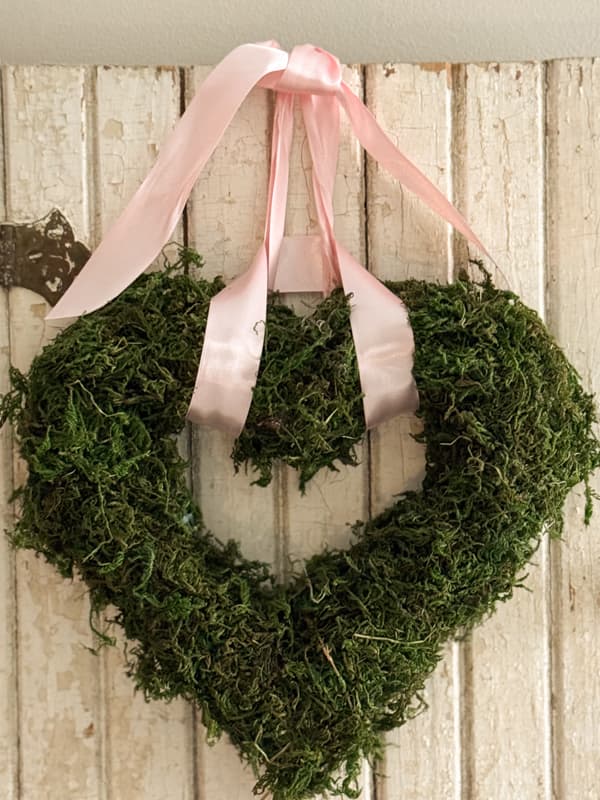 Dollar Tree Heart repurposed with moss for Valentine Door Hanger