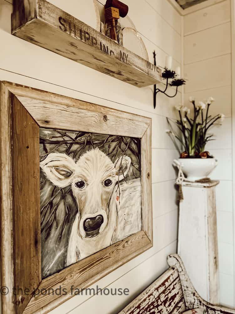 Cow painting for farmhouse dining room and cottage style cozy winter decorating.