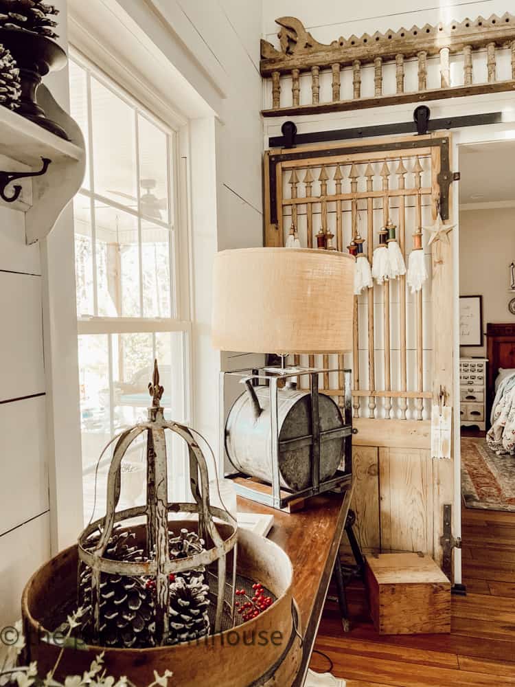 Barn Door and repurposed gas can lamp for winter decorating