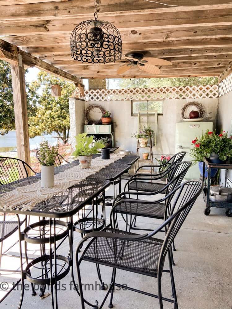 inside dining table with vintage cookstove and antique refrigerator.Vintage and thrift store finds.