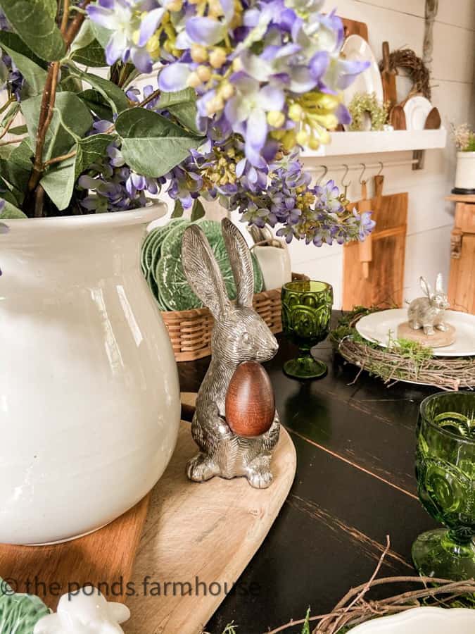 Easter Tablescape with pewter bunnies and DIY Twig & Moss plate chargers with vintage ironstone dishes.