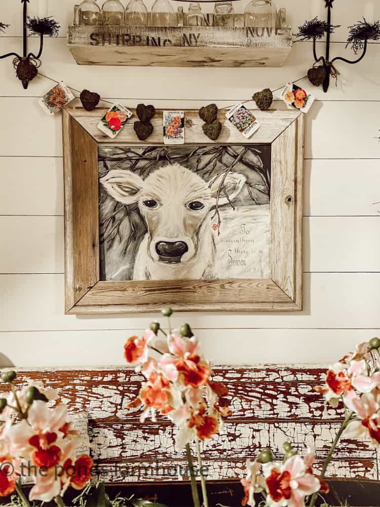 DIY Heart Garland Wreath. Rustic bench with cow print.