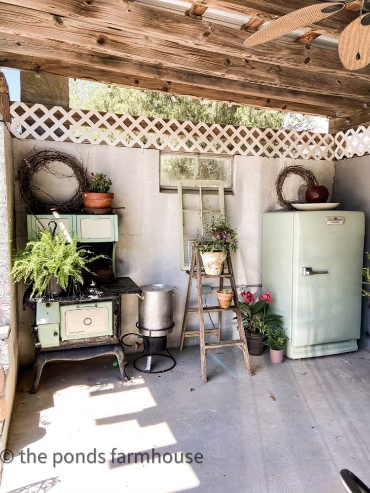 Vintage stove and refrigerator in outdoor kitchen