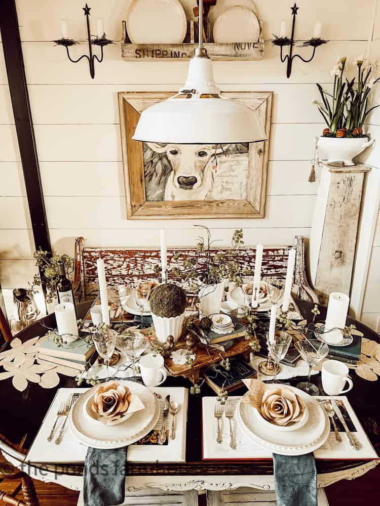 Book Club Brunch Table Setting Idea,  decorated with old books and vintage paper roses.  