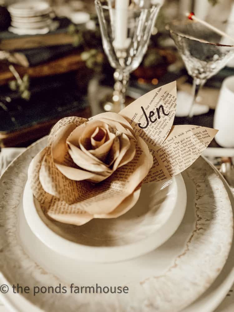 DIY Vintage book page roses used as place cards for a book club themed supper club brunch.  