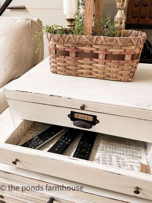 remote control holder - repurposed silverware box.  Trash to treasure transformation.  