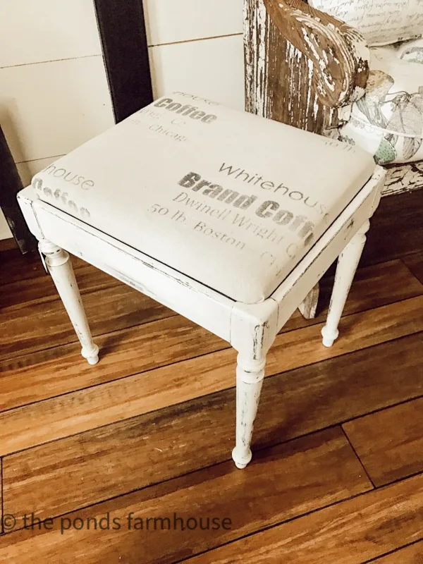 thrift store stool with chalk paint and recovered seat cushion.  